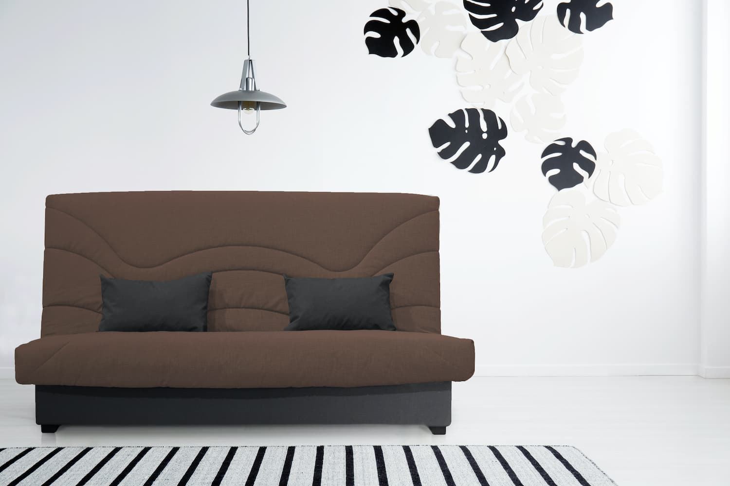 Sofá cama marrón y negro - Imagen 1